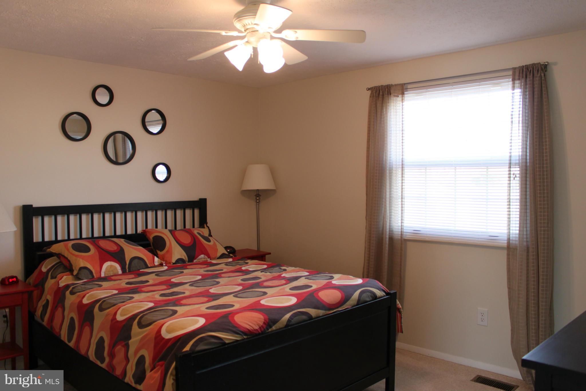 4404 Cub Run Road Chantilly, VA 20151 - Photo 14 of 30 a bedroom with a bed and a window