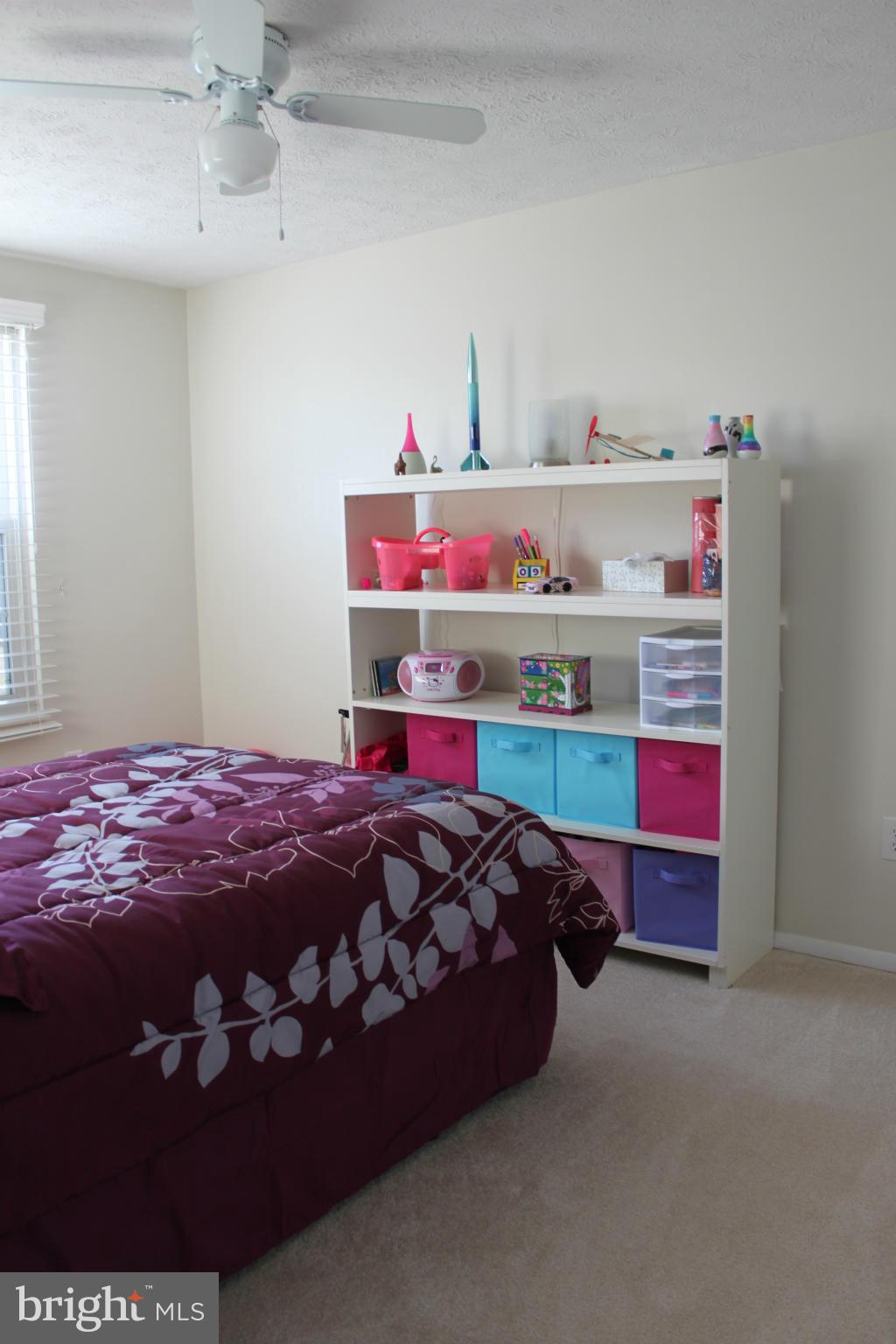 4404 Cub Run Road Chantilly, VA 20151 - Photo 19 of 30 a bedroom with a bed and dresser