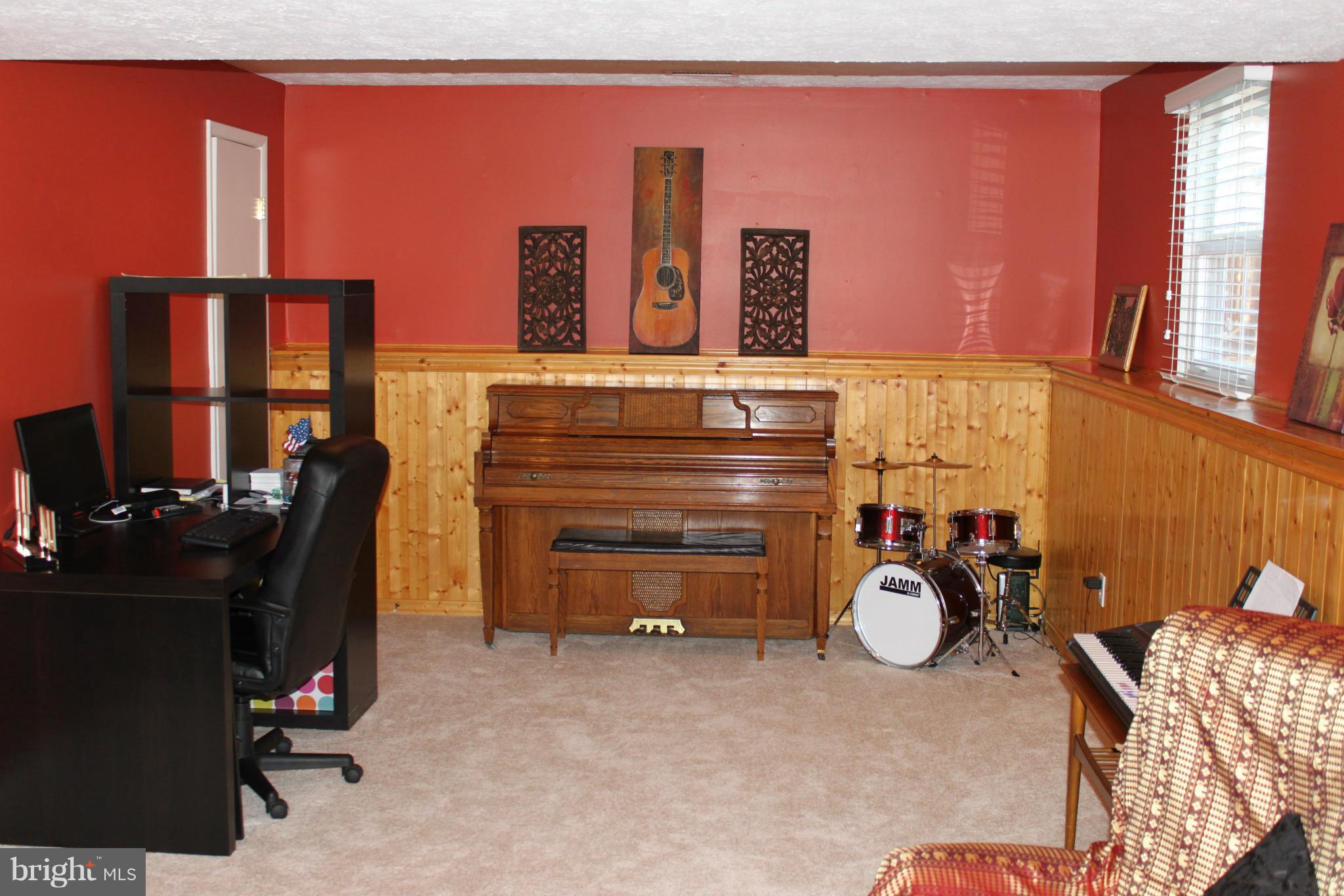 4404 Cub Run Road Chantilly, VA 20151 - Photo 23 of 30 a view of a room with music instruments