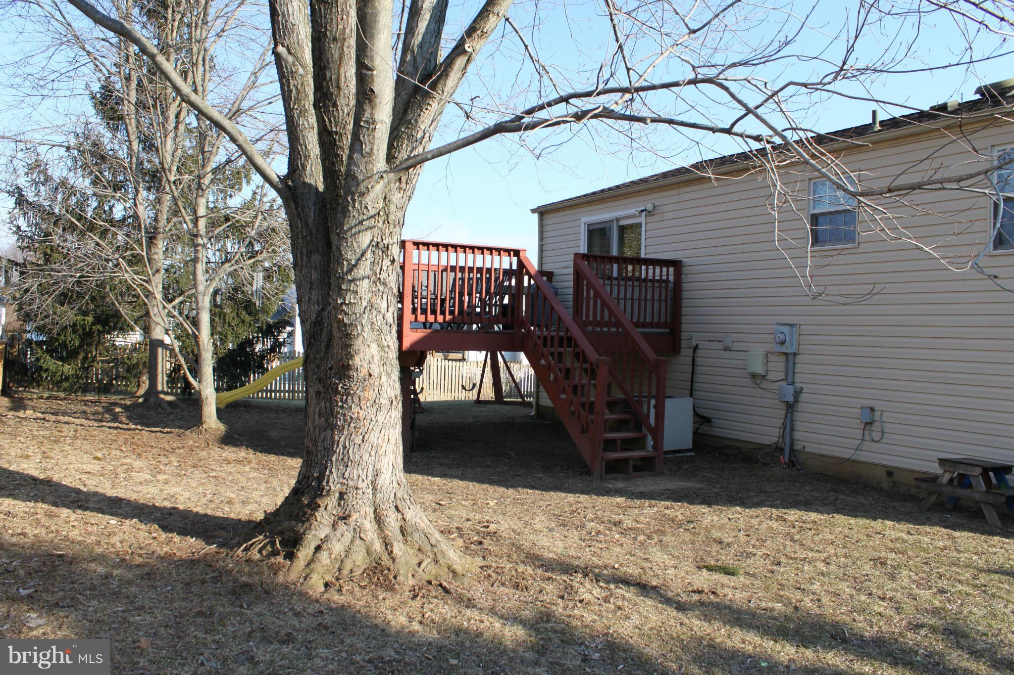 4404 Cub Run Road Chantilly, VA 20151 - Photo 28 of 30 a view of a house with a yard covered in snow