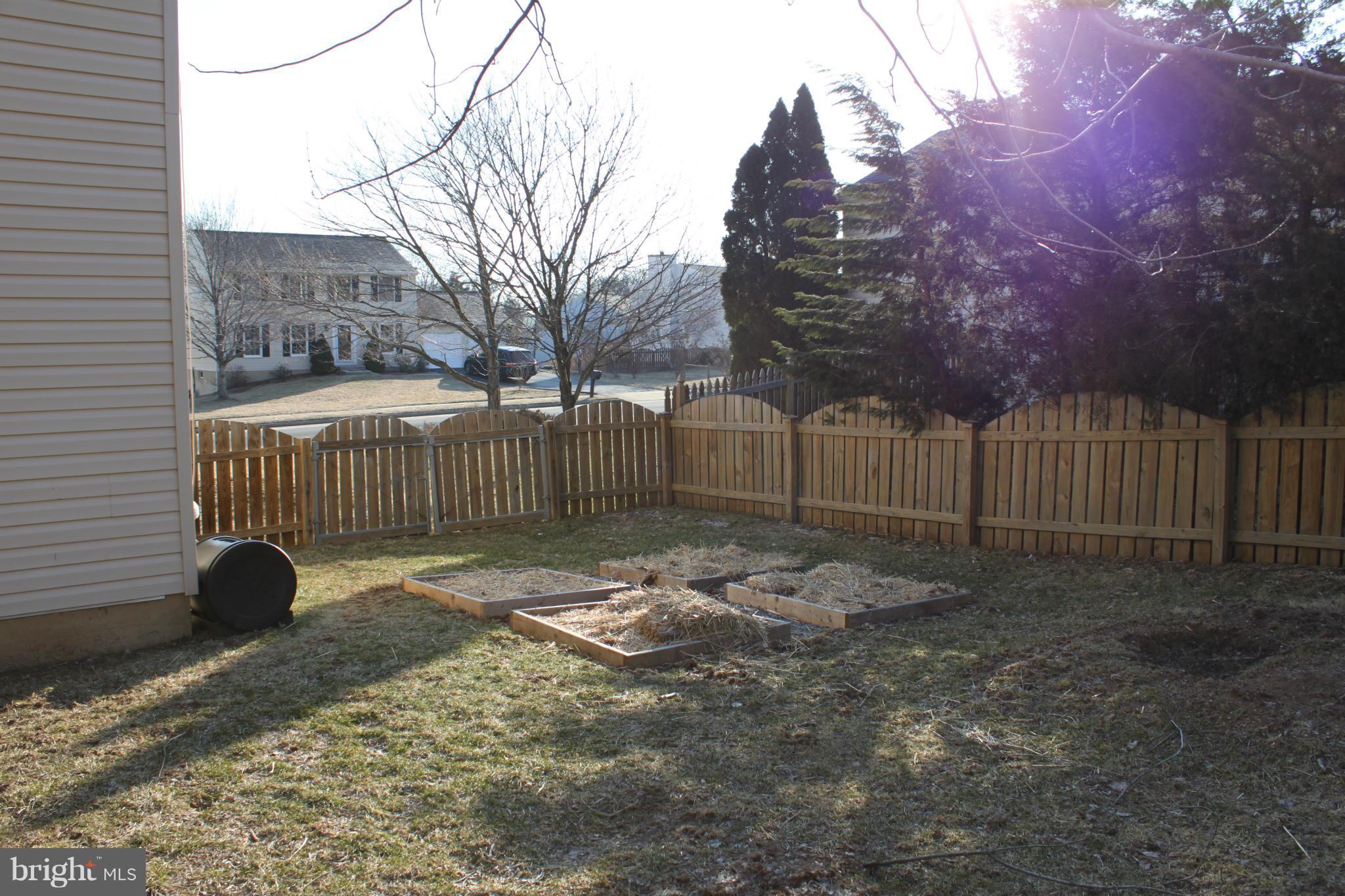 4404 Cub Run Road Chantilly, VA 20151 - Photo 29 of 30 a view of a yard with large trees and wooden fence