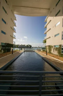a view of a patio with swimming pool