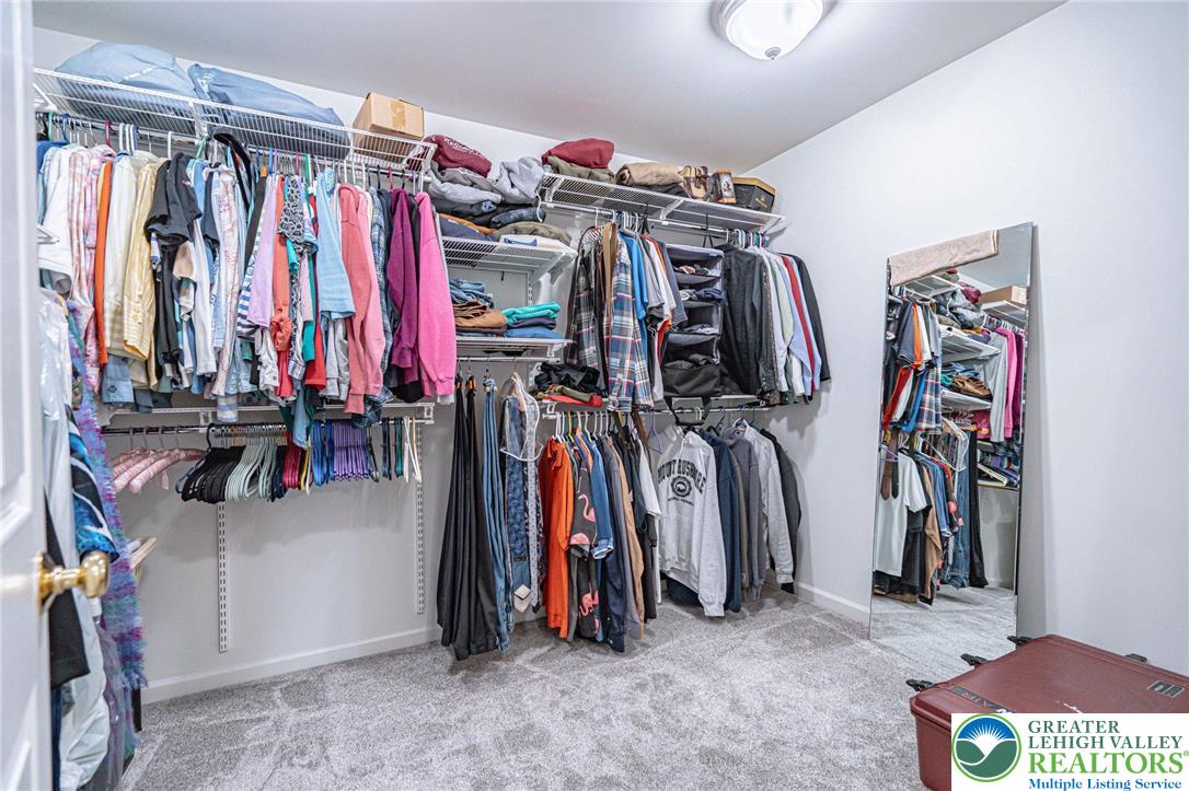 6551 Overlook Road Orefield, PA 18069 - Photo 45 of 82 a view of walk in closet with clothes