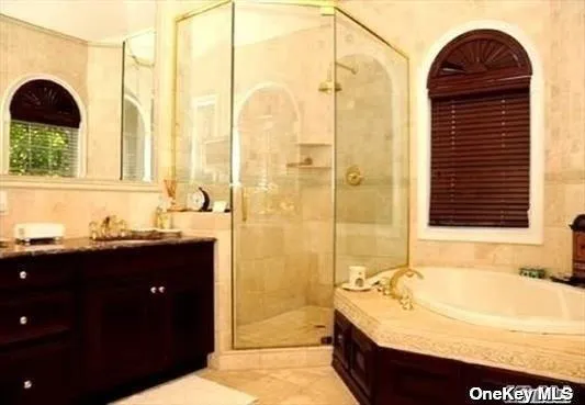 a bathroom with a bathtub and a sink