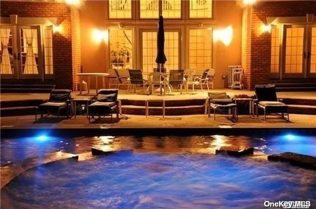 a living room with furniture window and wooden floor