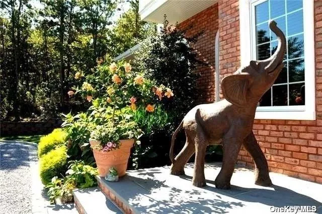 a view of balcony with wooden floor and outdoor seating