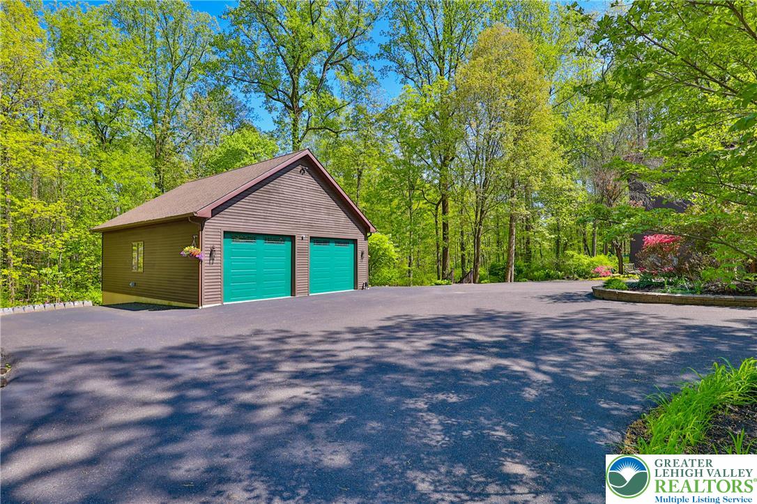 2159 Quarry Road Coopersburg, PA 18036 - Photo 53 of 79 Detached 2 bay heated garage with workshop area. Shop includes an air filtration system and vacuum. All other shop equipment is for sale but NOT included in the purchase price