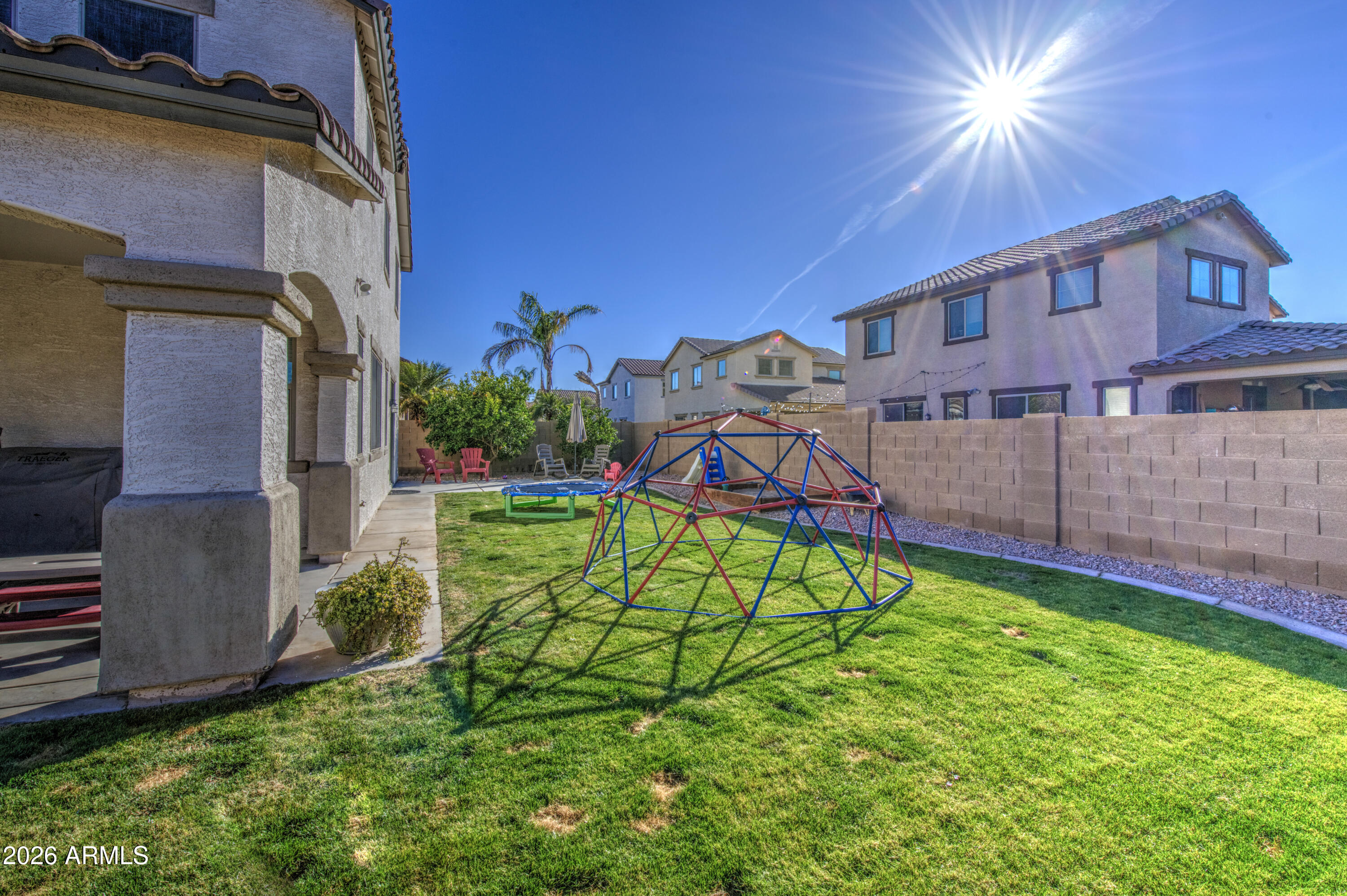 21303 East Alyssa Road Queen Creek, AZ 85142 - Photo 27 of 29 a view of a house with a yard