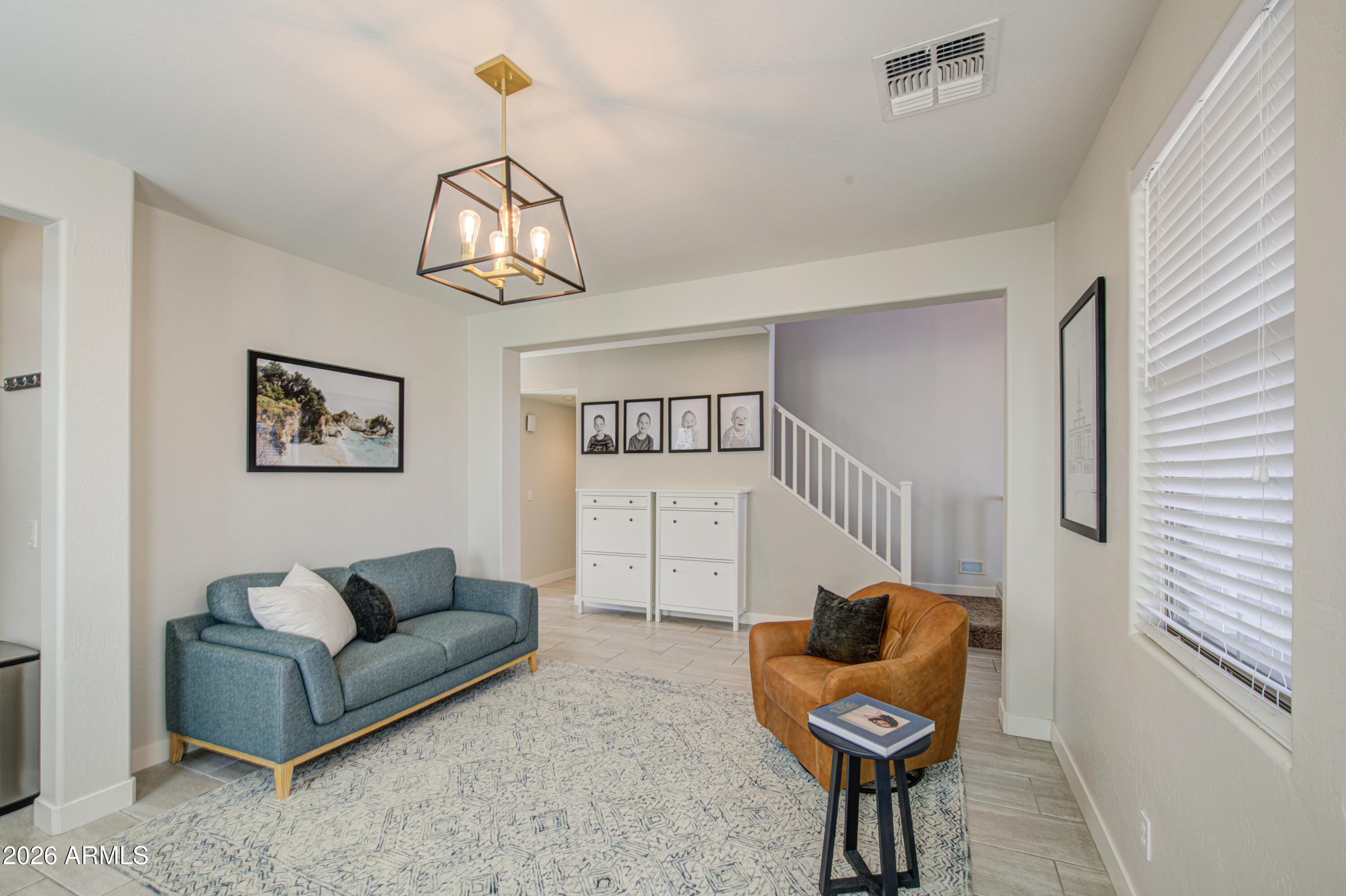 21303 East Alyssa Road Queen Creek, AZ 85142 - Photo 6 of 29 a living room with furniture