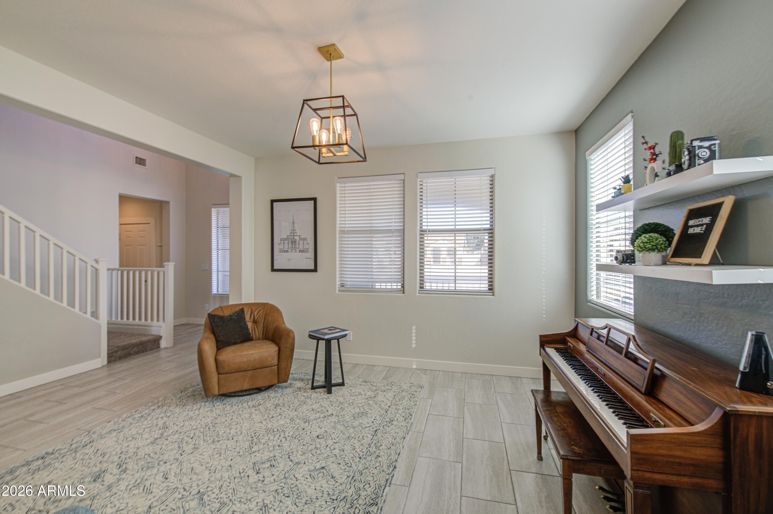 21303 East Alyssa Road Queen Creek, AZ 85142 - Photo 7 of 29 a living room with furniture and a window