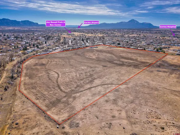 a view of an ocean and a mountain