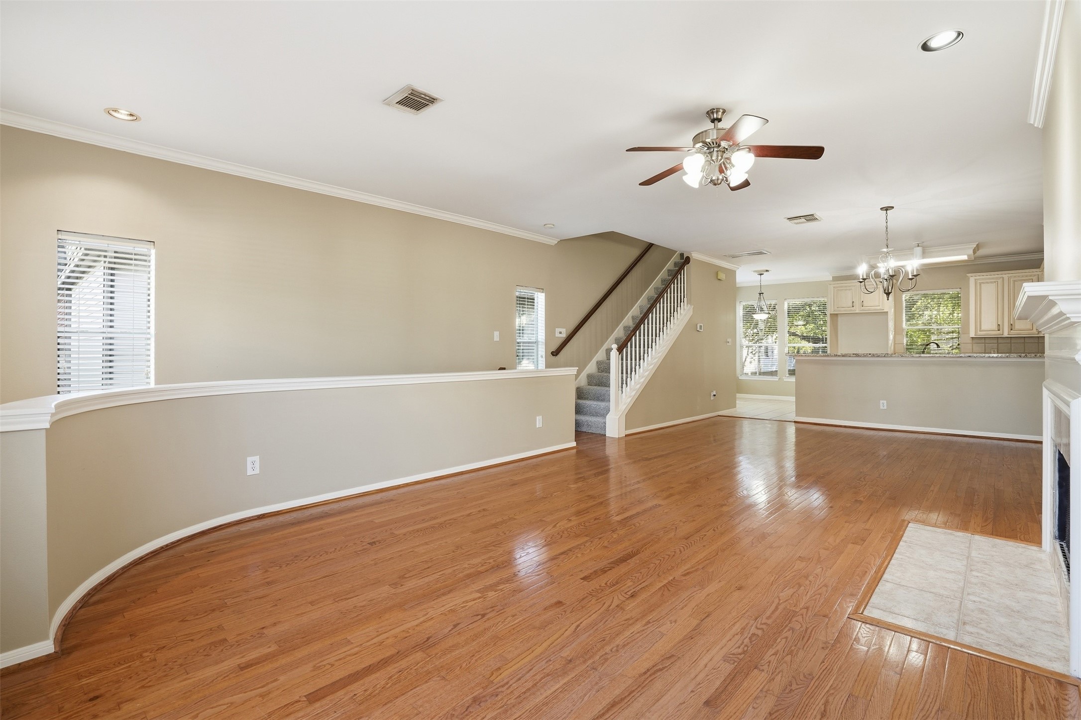 1809 Gillette Street Houston, TX 77019 - Photo 12 of 35 wooden floor in an empty room with a window