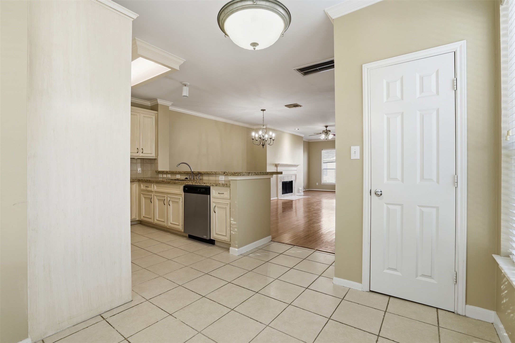 1809 Gillette Street Houston, TX 77019 - Photo 18 of 35 a kitchen with white cabinets and white appliances