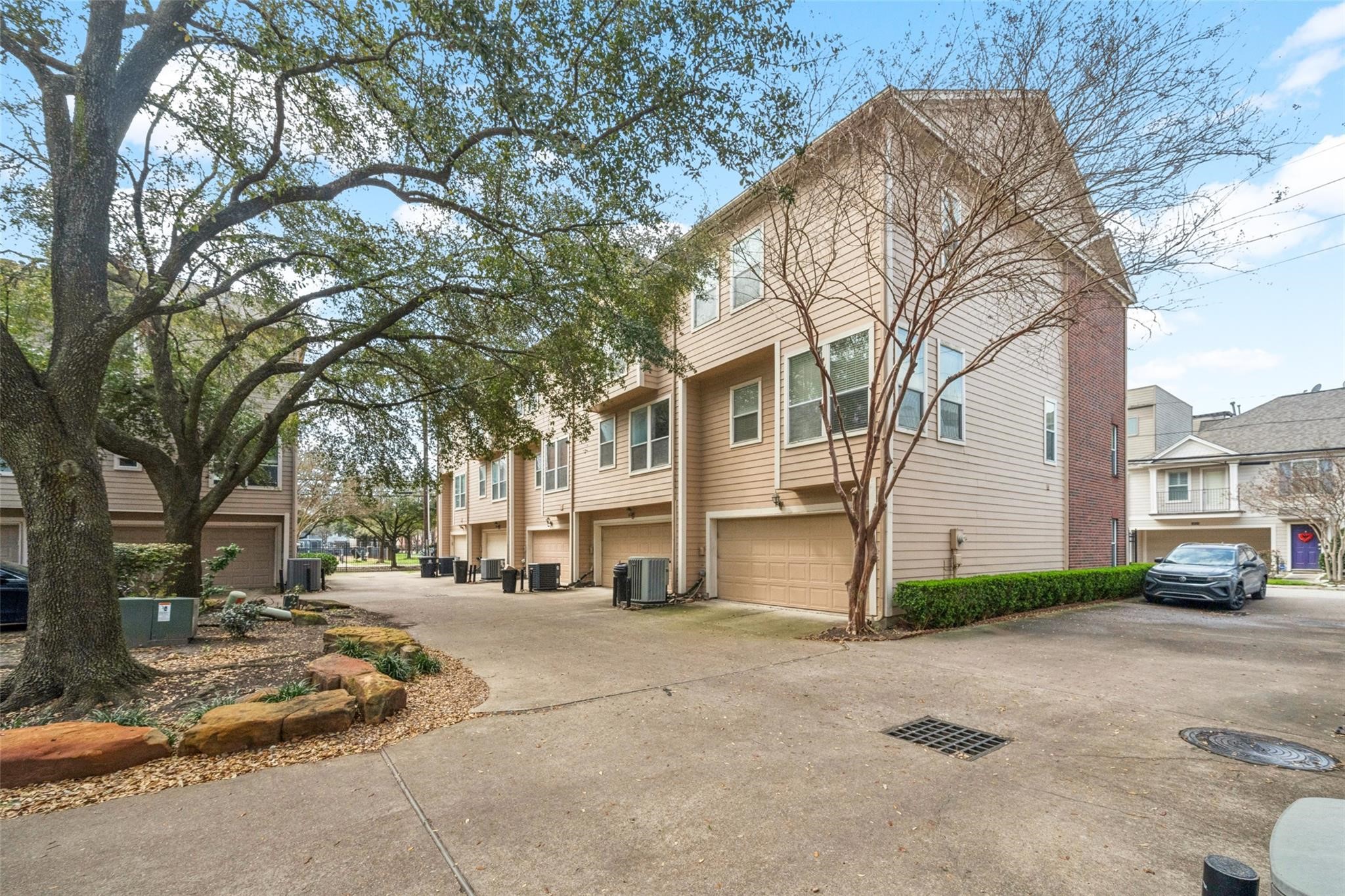 1809 Gillette Street Houston, TX 77019 - Photo 28 of 35 a view of a street with a building in the background