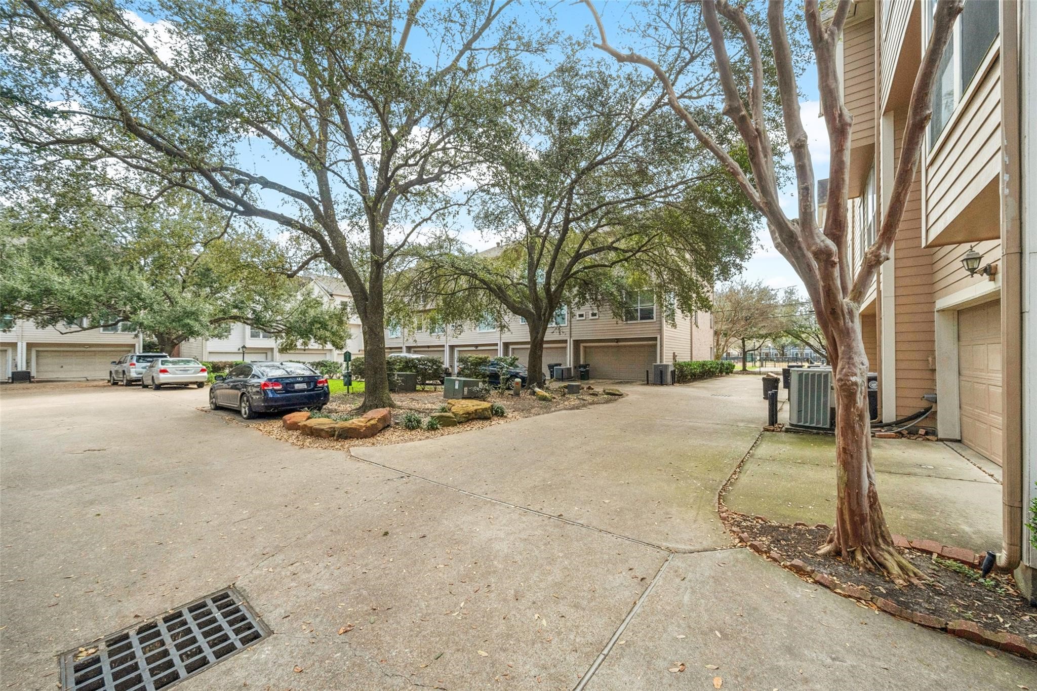 1809 Gillette Street Houston, TX 77019 - Photo 29 of 35 a view of a city street with a car parked on the road