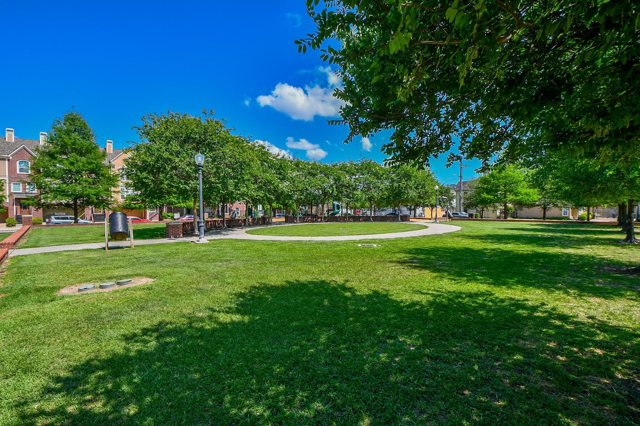1809 Gillette Street Houston, TX 77019 - Photo 34 of 35 a view of a park with a tree in the background