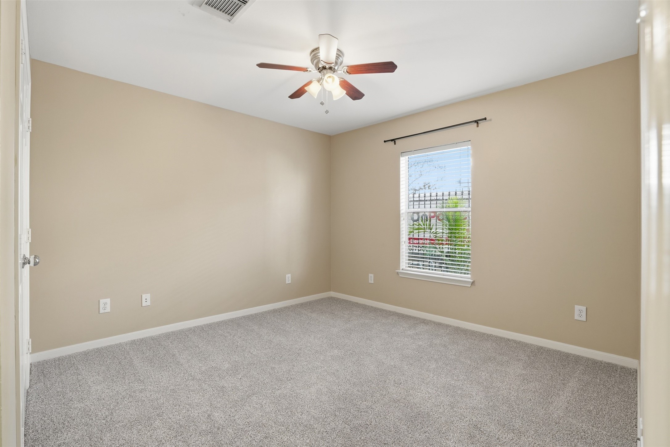 1809 Gillette Street Houston, TX 77019 - Photo 6 of 35 a view of an empty room with a window