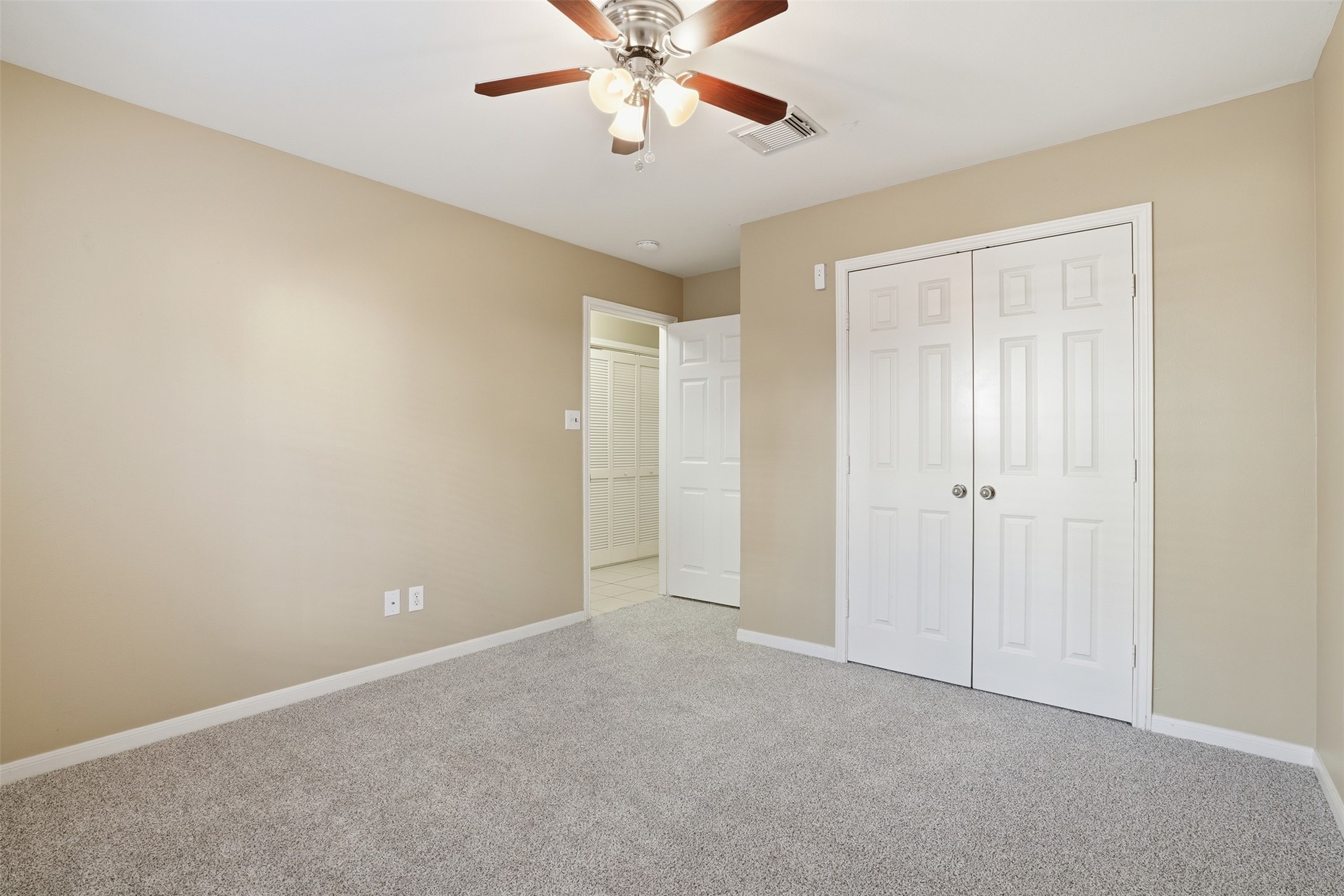 1809 Gillette Street Houston, TX 77019 - Photo 7 of 35 a view of an empty room and chandelier fan