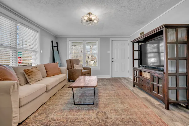 a bathroom with a toilet a sink and a mirror
