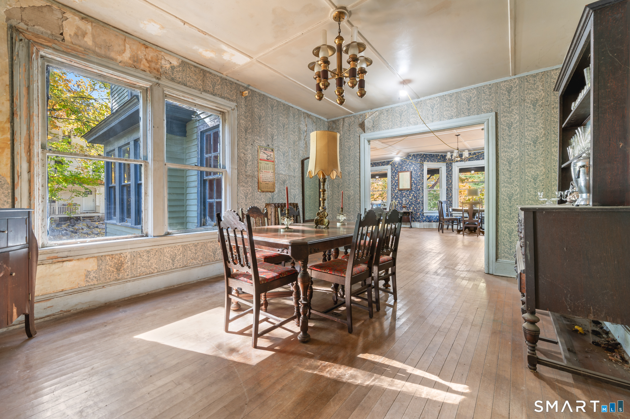 124 River Road Willington, CT 06279 - Photo 15 of 40 a view of a dining room with furniture window and wooden floor