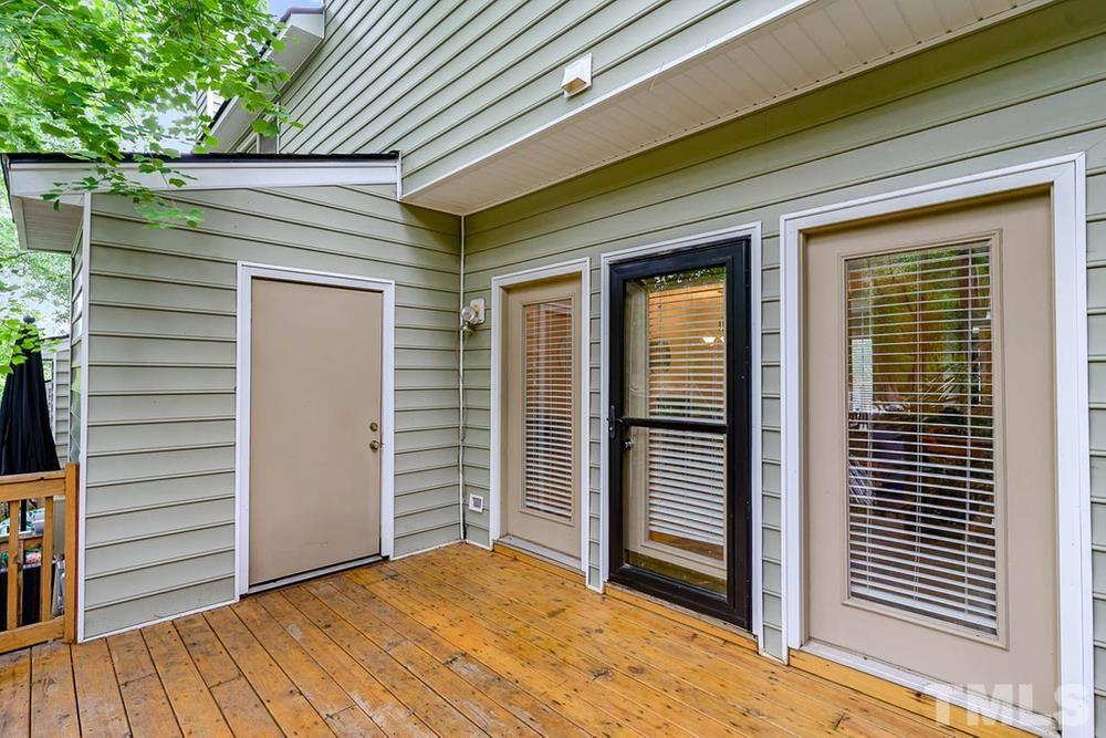 6129 Highcastle Court Raleigh, NC 27613 - Photo 17 of 23 a view of front door and garage