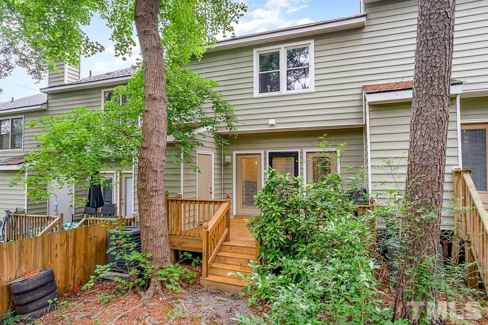 6129 Highcastle Court Raleigh, NC 27613 - Photo 23 of 23 a view of a house with a yard