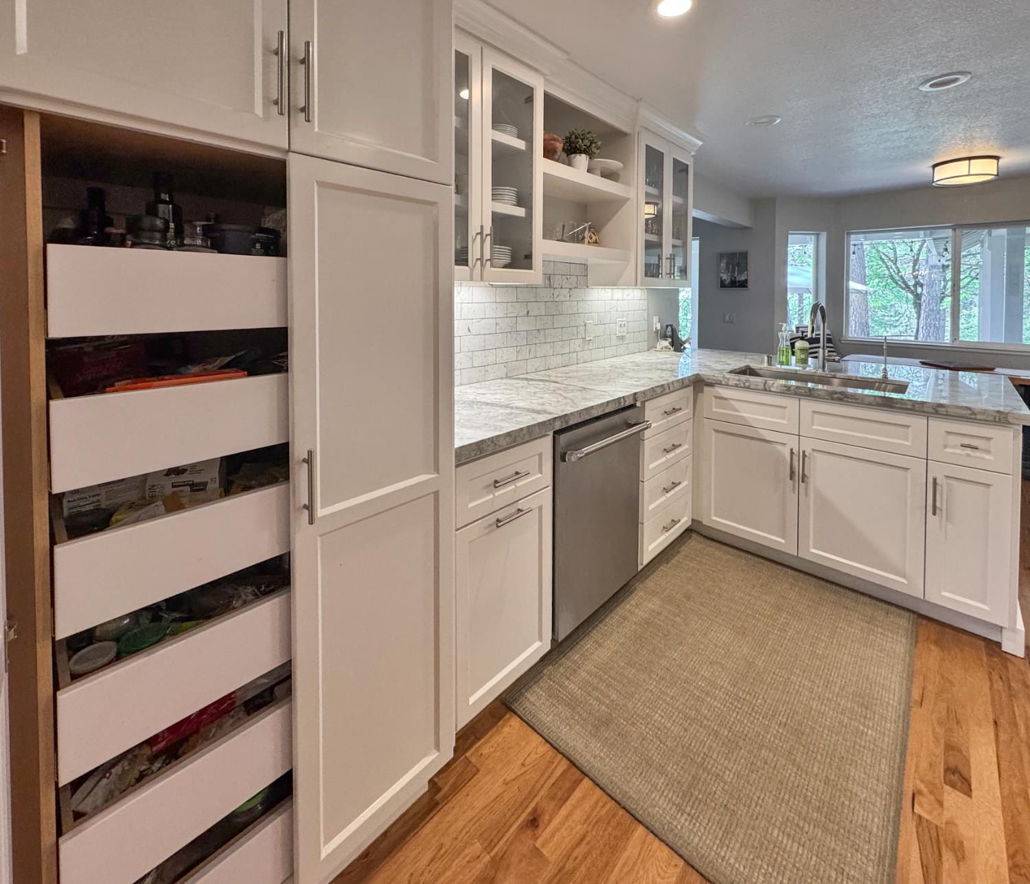 1795 Volley Road Meadow Vista, CA 95722 - Photo 12 of 34 a large white kitchen with granite countertop a sink