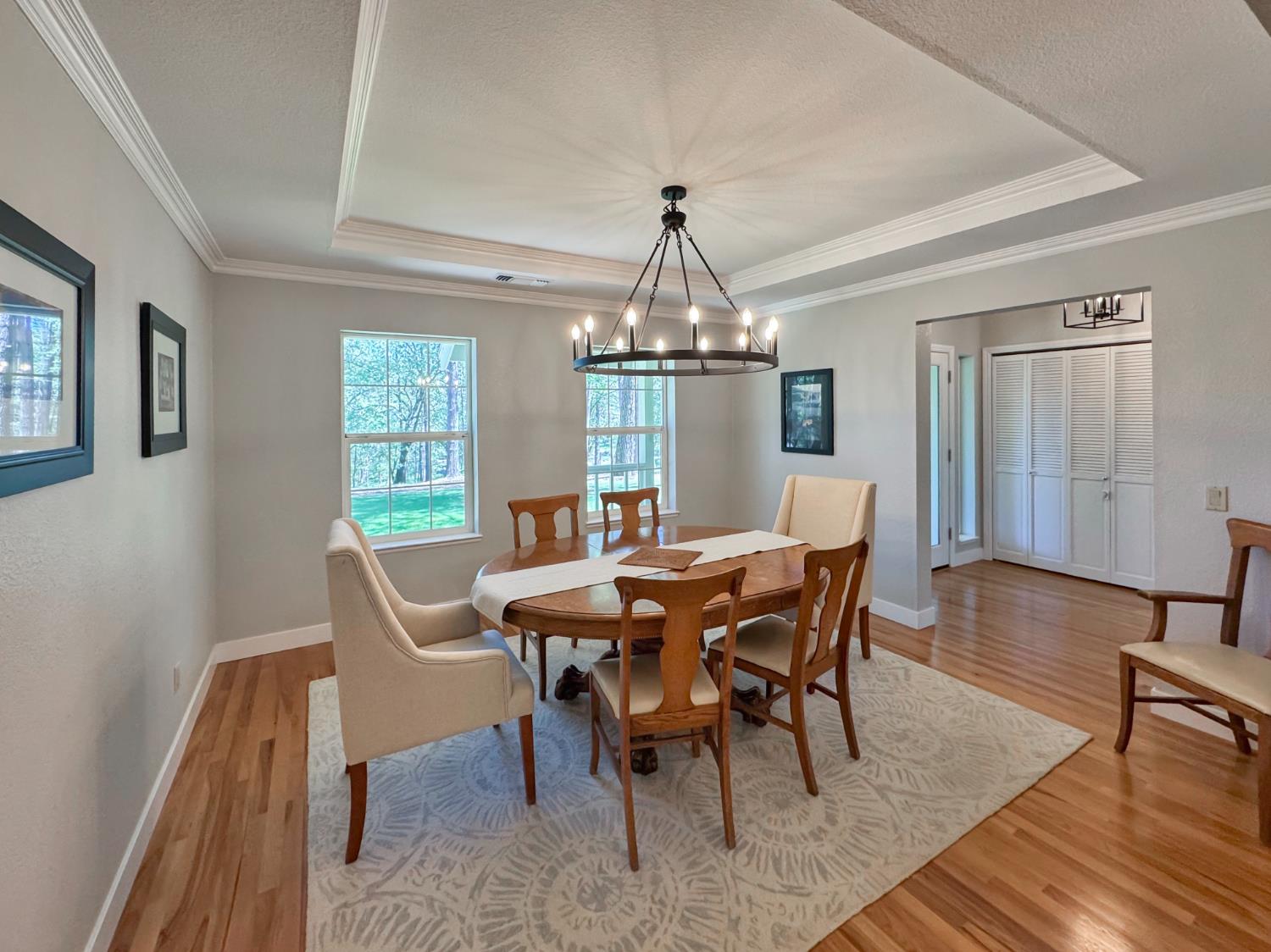 1795 Volley Road Meadow Vista, CA 95722 - Photo 13 of 34 a view of a dining room with furniture window and wooden floor