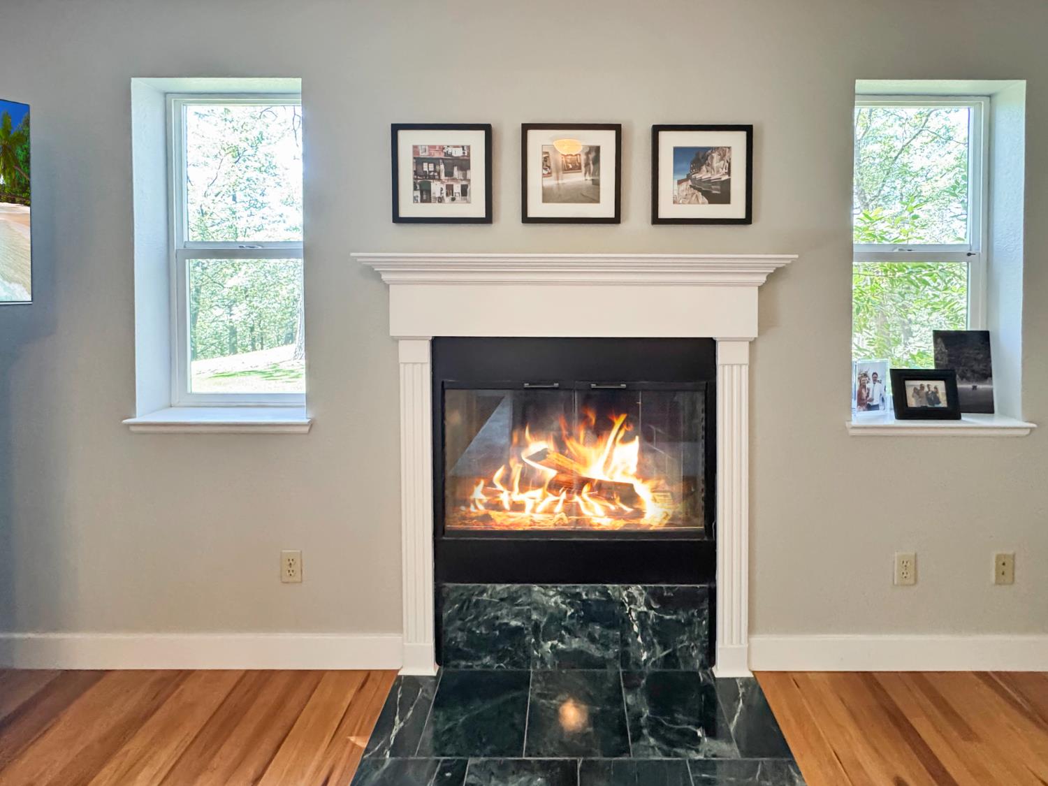 1795 Volley Road Meadow Vista, CA 95722 - Photo 16 of 34 a living room with fireplace and a flat screen tv