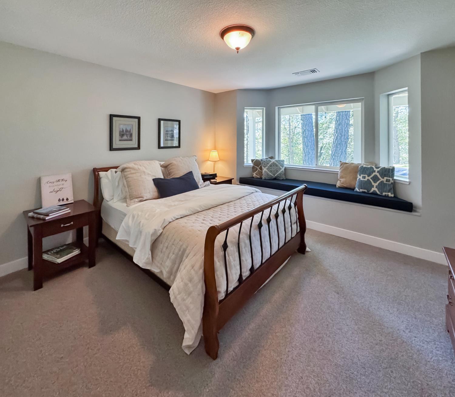 1795 Volley Road Meadow Vista, CA 95722 - Photo 20 of 34 a bedroom with a bed and a couch