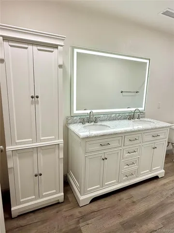 a room with a bed and a desk