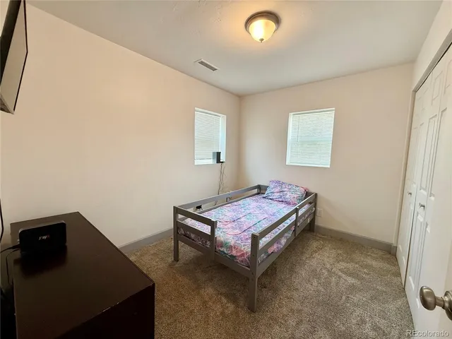 an empty room with a natural light