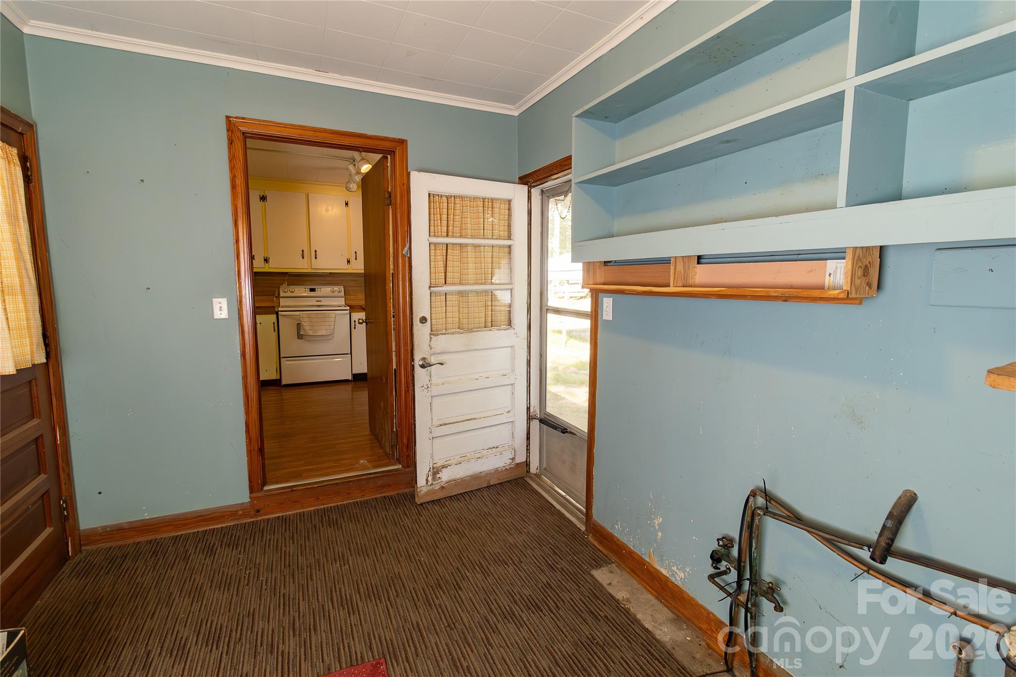 609 Wilcox Avenue Gaffney, SC 29341 - Photo 15 of 23 a view of empty room with wooden floor and fan