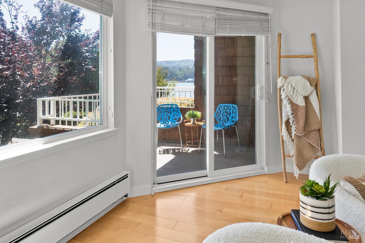 110 Seminary Drive, Unit 1A Mill Valley, CA 94941 - Photo 4 of 27 a room with furniture and a potted plant