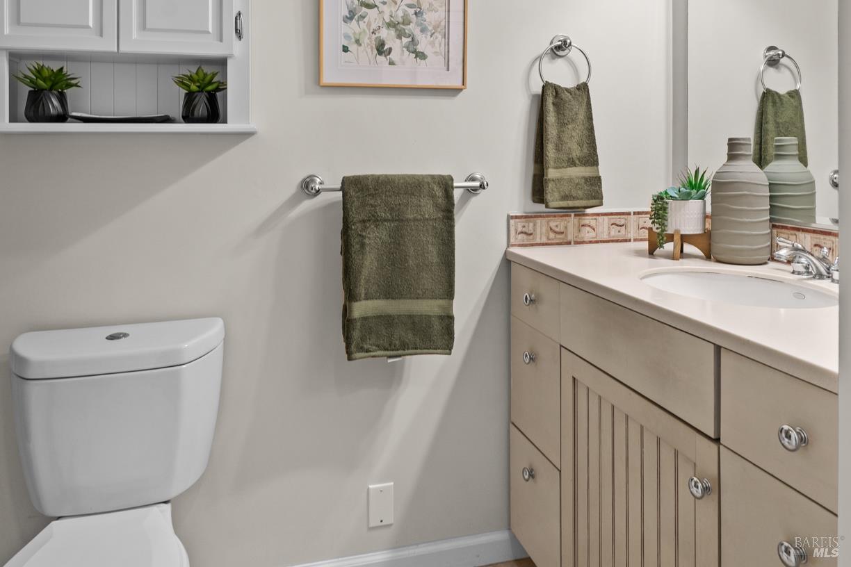 110 Seminary Drive, Unit 1A Mill Valley, CA 94941 - Photo 9 of 27 a bathroom with a sink and a mirror
