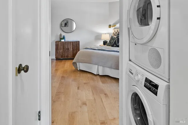 a bedroom with bed and a couch