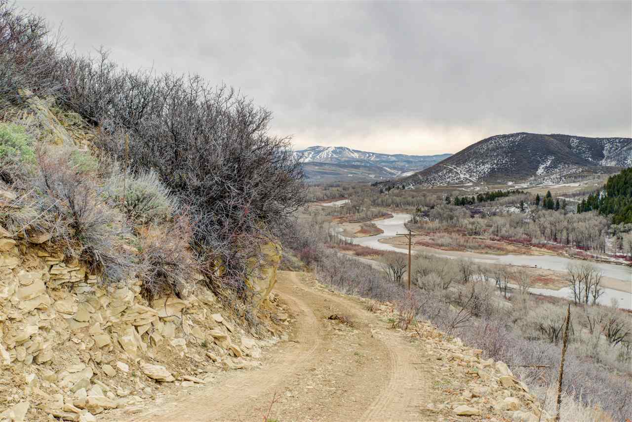 480 Ranch Road Hayden, CO 81639 - Photo 5 of 10 a view of a dry field with mountains in the background