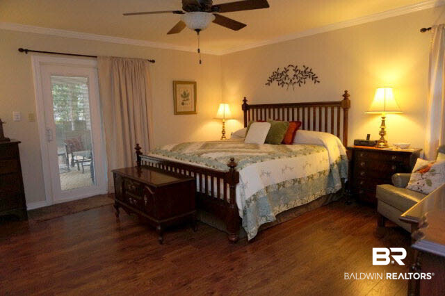 500 Oak Ridge Court West Daphne, AL 36526 - Photo 12 of 24 Master bedroom is spacious with hardwood flooring