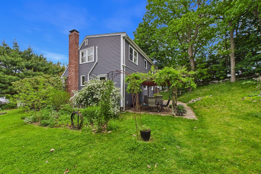 70 Neponset Street Canton, MA 02021 - Photo 36 of 39 a house view with a sitting space and garden