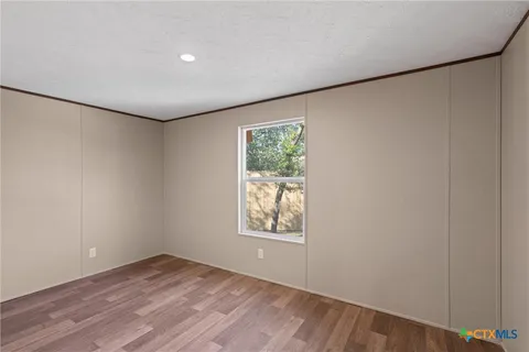 a bathroom with a toilet and a bathtub