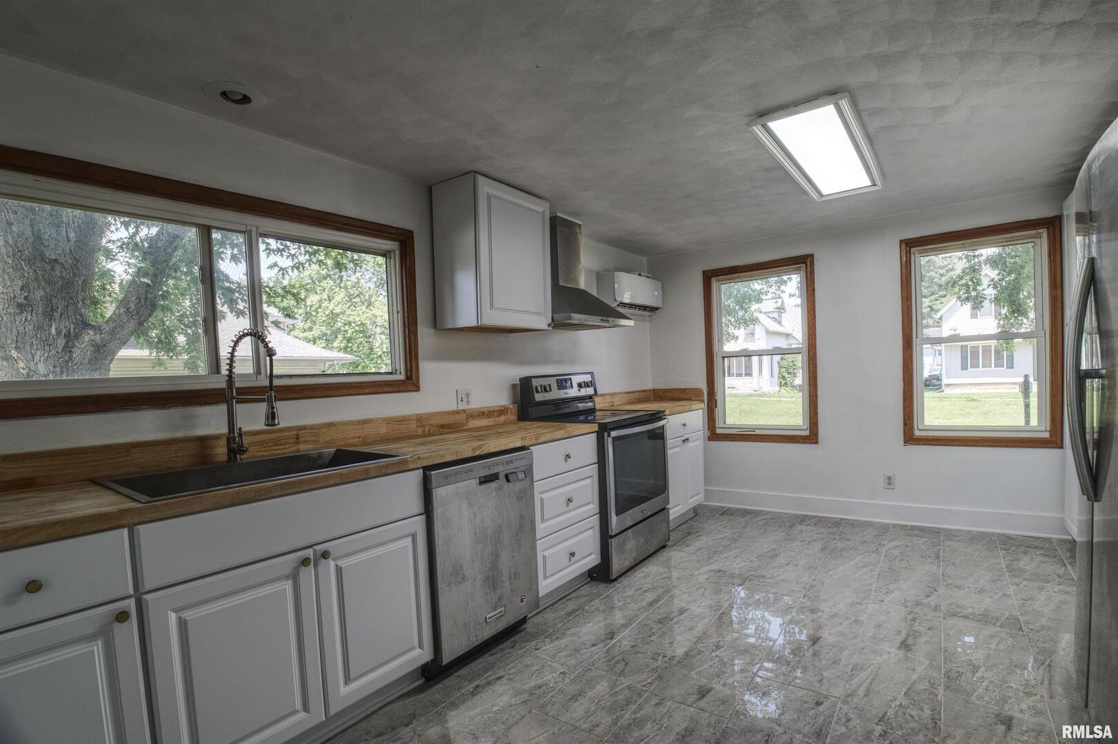 828 10th Avenue Fulton, IL 61252 - Photo 15 of 34 a kitchen with sink and window