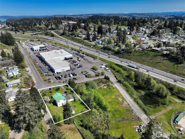 an aerial view of a house with a garden