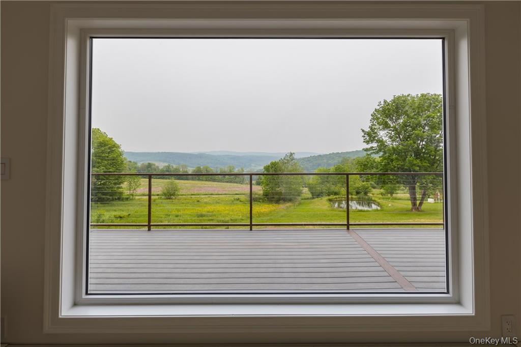 274 Reservoir Hill Road Norwich, NY 13815 - Photo 21 of 44 a view of ocean from a window