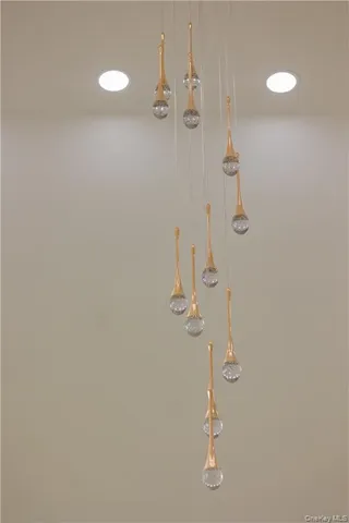 a very nice looking room with wooden floor and a window