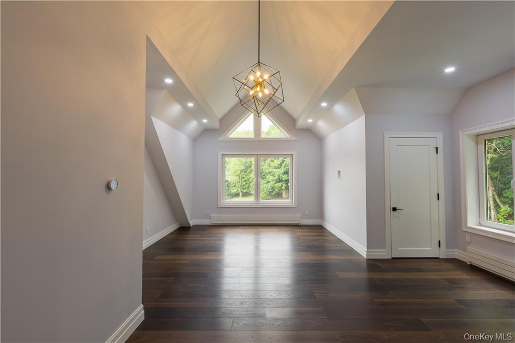 274 Reservoir Hill Road Norwich, NY 13815 - Photo 27 of 44 a very nice looking room with wooden floor and a window