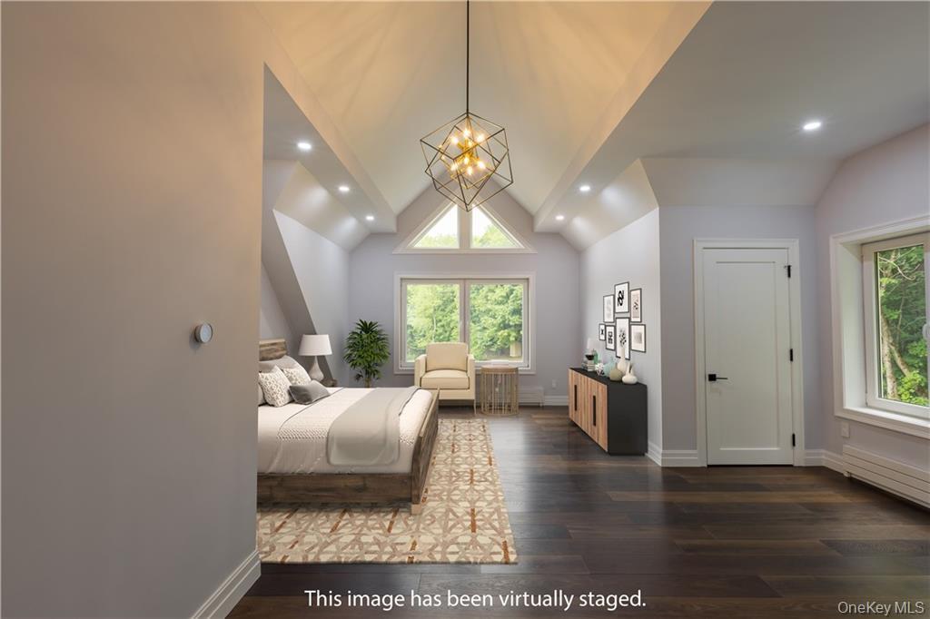 274 Reservoir Hill Road Norwich, NY 13815 - Photo 28 of 44 a living room with furniture chandelier and a window