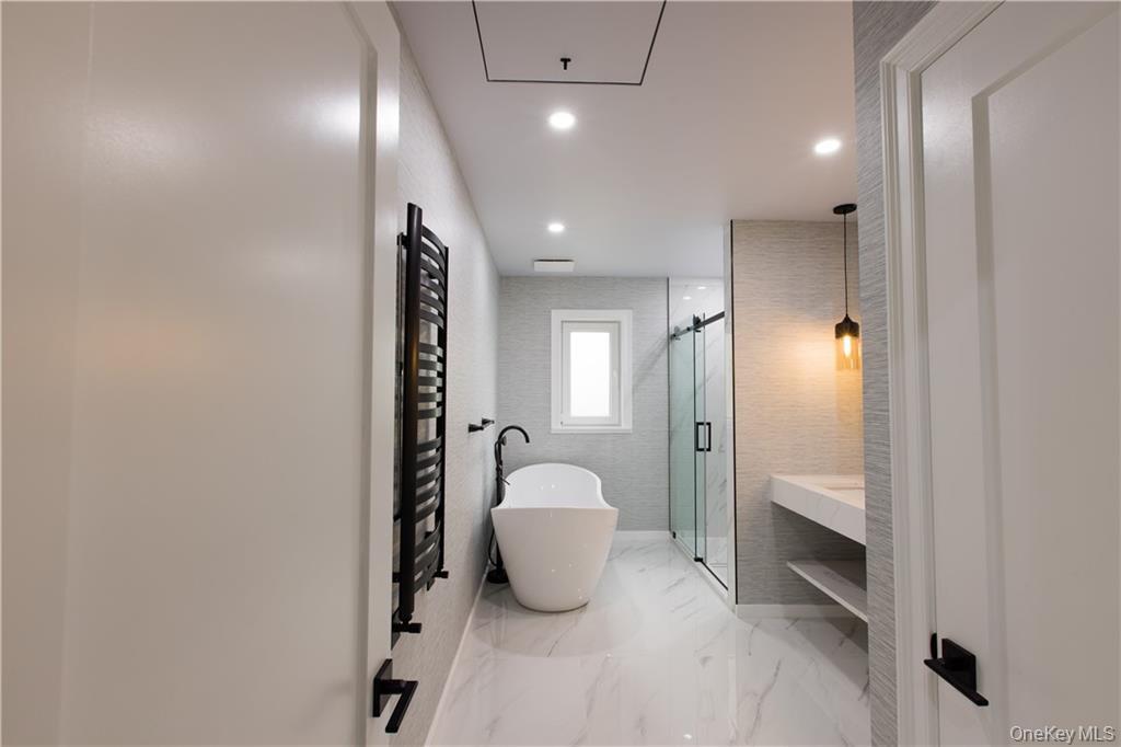 274 Reservoir Hill Road Norwich, NY 13815 - Photo 29 of 44 a bathroom with a sink and a mirror