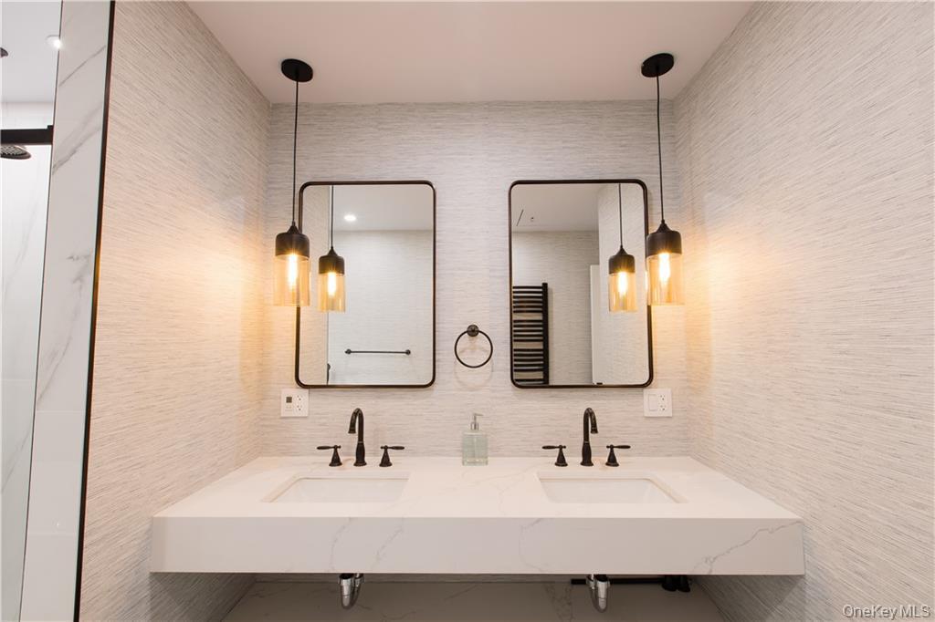 274 Reservoir Hill Road Norwich, NY 13815 - Photo 30 of 44 a bathroom with a sink and a mirror