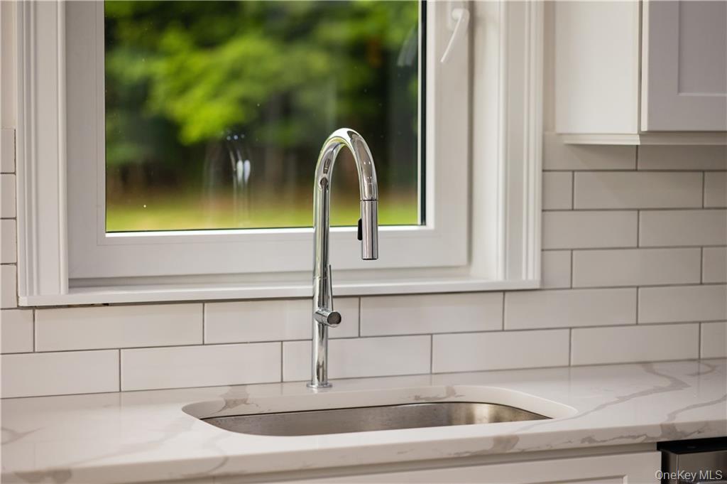 274 Reservoir Hill Road Norwich, NY 13815 - Photo 4 of 44 a close view of sink and tap