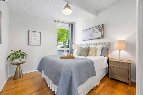 a view of a patio with a dining table and chairs
